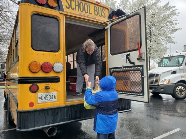 Photo of School Bus Serving Community Meals